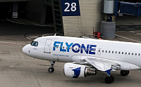 FLYONE подключён к Портретикс